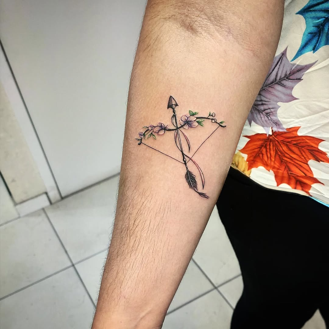 Elegant Sagittarius Tattoo with Floral Accents