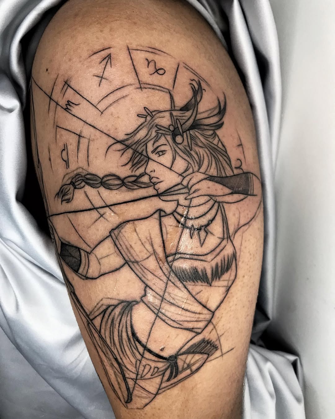 Elegant Sagittarius archer tattoo with feminine details