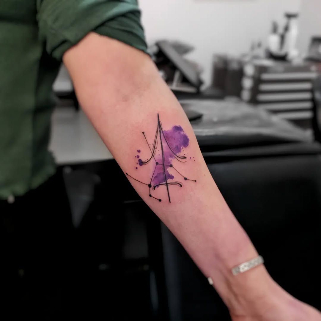 Artistic Sagittarius tattoo featuring abstract elements