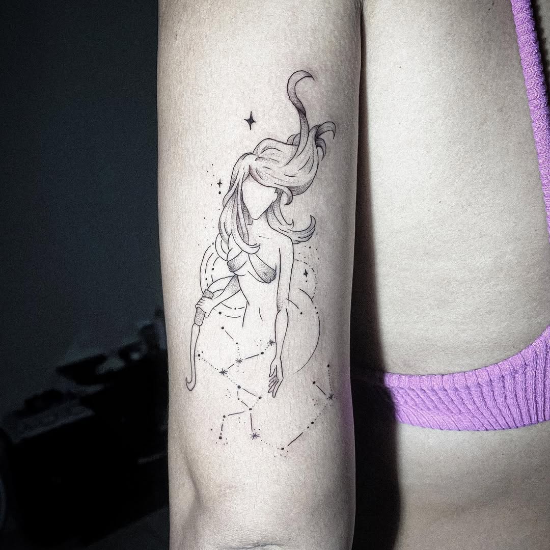 Elegant Sagittarius tattoo blending art and astrology