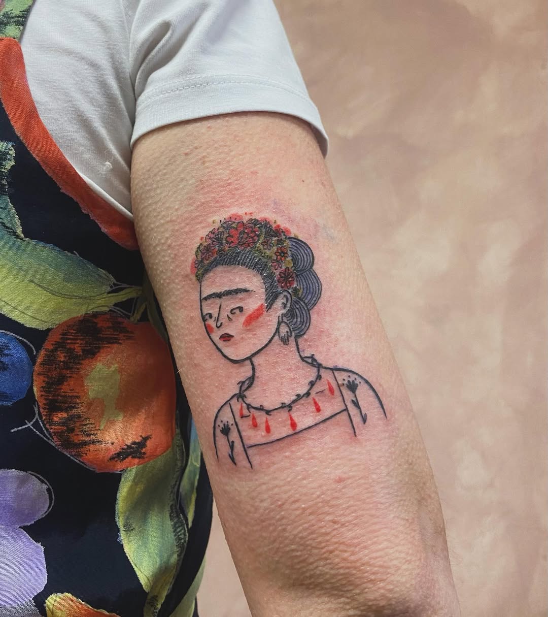 Vibrant Frida Kahlo Tattoo with Floral Elements