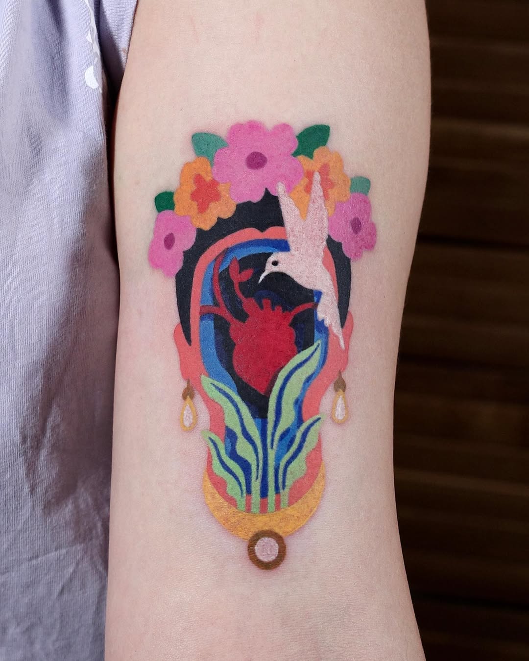Vibrant Frida Kahlo-Inspired Tattoo Design