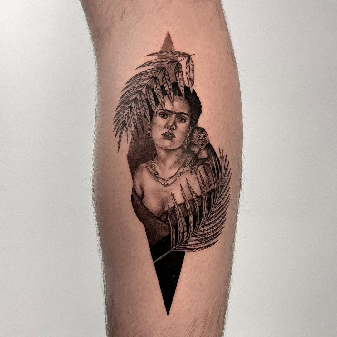 Striking Frida Kahlo tattoo with tropical vibes