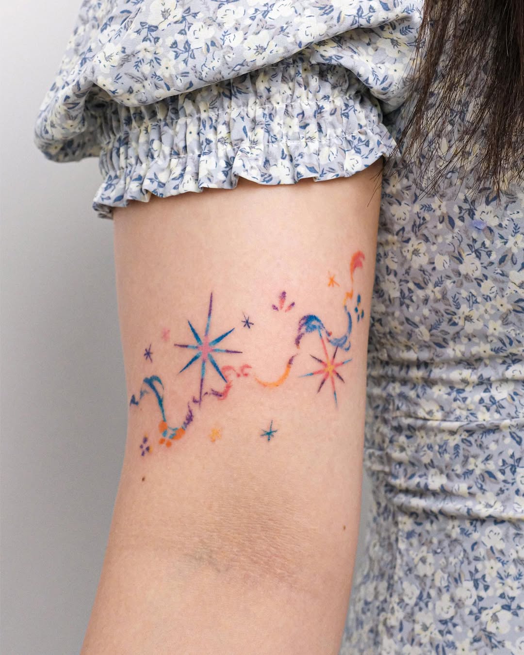 Whimsical star tattoos for a celestial vibe